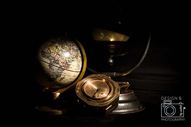 Design and Photography by Rachel - Studio Quality Background Lighting globe and compass composition photograph
